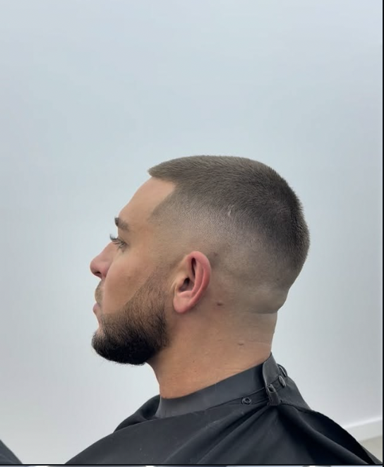 Clean skin fade with beard shape-up